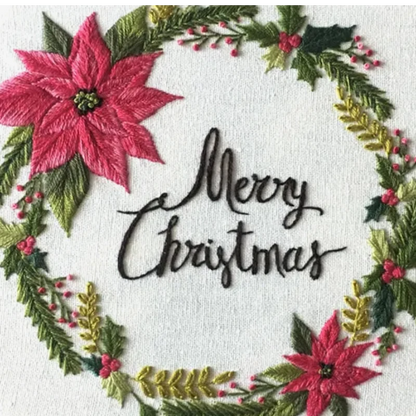 Embroidered design with 'Merry Christmas' text surrounded by poinsettias and holly leaves on a white background.