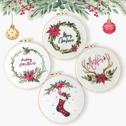 Set of Christmas-themed embroidery hoops with festive designs on a white background.