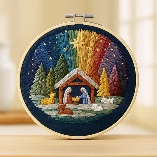 This embroidery captures a serene nativity scene bathed in radiant colors.
A golden star shines above the humble manger, while Mary and Joseph gently watch over the newborn child.
Surrounded by quiet forests and peaceful animals, the scene glows with warmth, faith, and love — a symbol of peace that softly touches the heart.