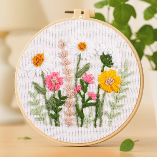 Inspired by the beauty of blooming meadows, this design features daisies, marigolds, and pink wildflowers arranged in a natural, carefree composition. The soft color palette and simple stitches make it a delightful project for both beginners and experienced crafters. Perfect for adding a touch of nature and warmth to your home décor.